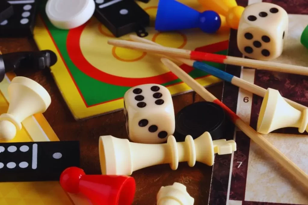 a group of board games and dice